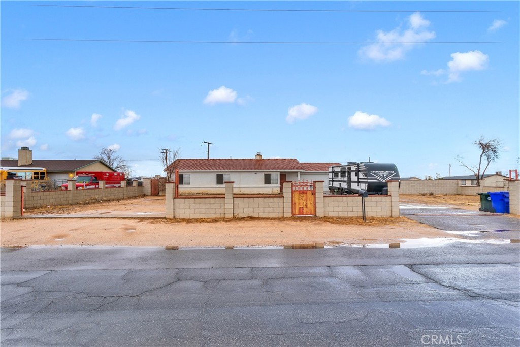 10672 Quinnault Road Apple Valley, CA 92308 - Photo 1 of 1 a park with table and chairs