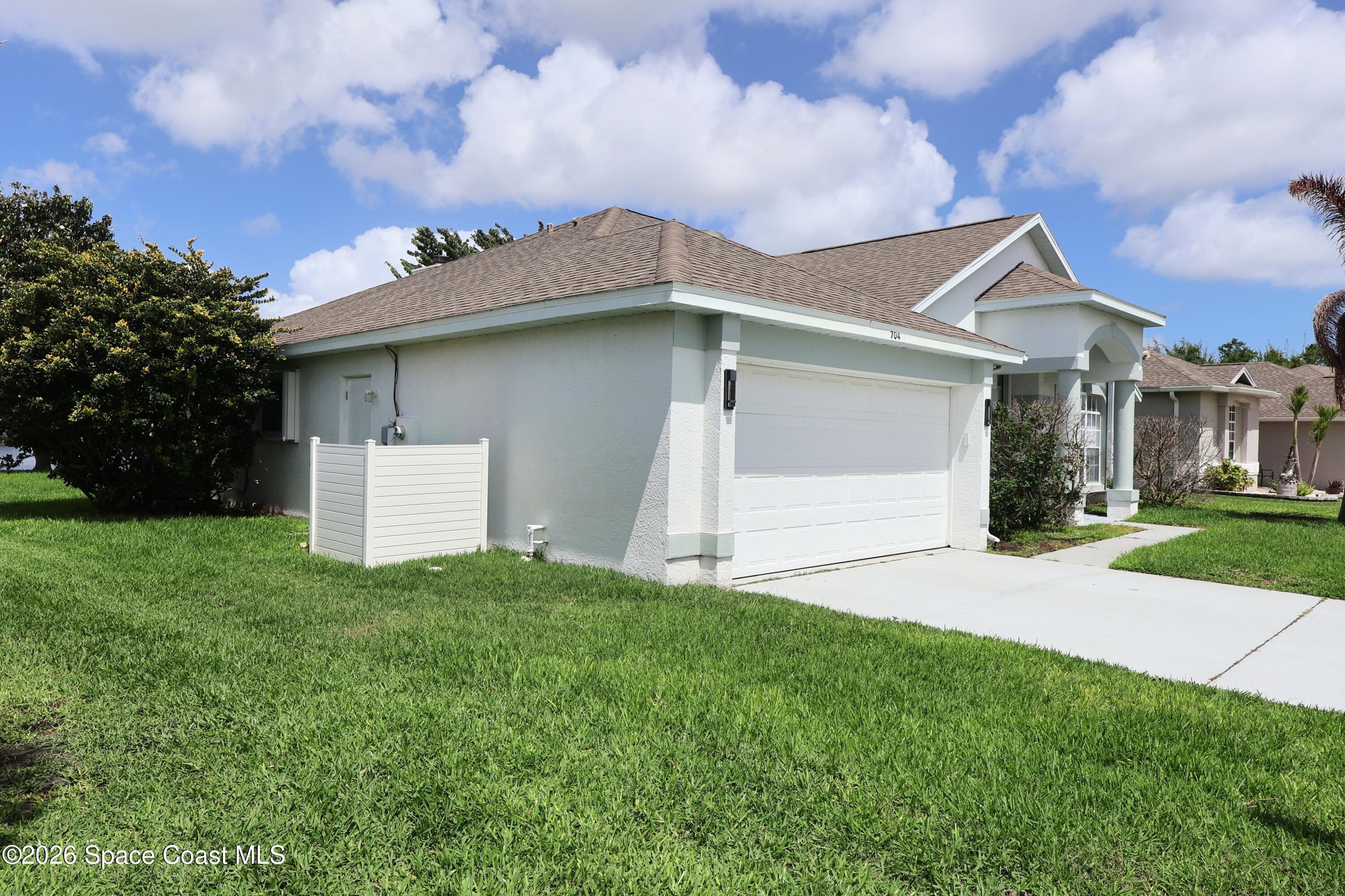 704 Carriage Hill Road Melbourne, FL 32940 - Photo 6 of 59 Lateral