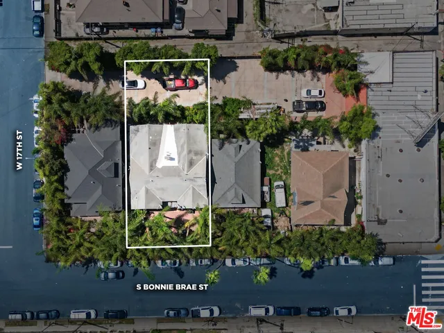 an outdoor space with lots of flowers