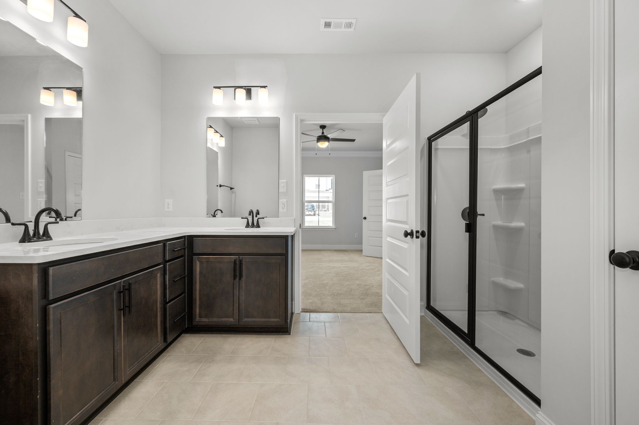 530 Rohan Drive Murfreesboro, TN 37129 - Photo 13 of 31 a bathroom with a double vanity sink mirror and shower