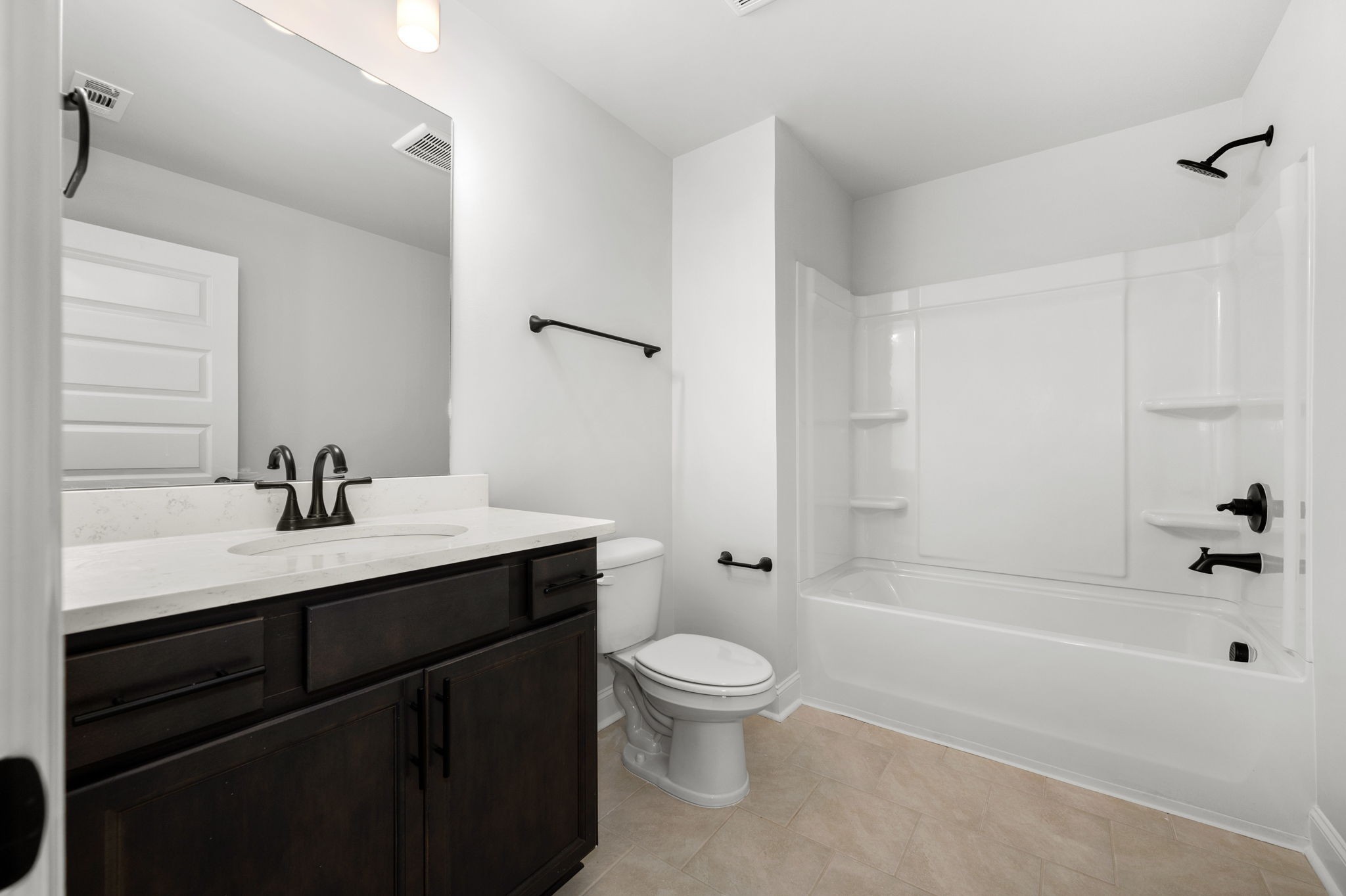 530 Rohan Drive Murfreesboro, TN 37129 - Photo 20 of 31 a bathroom with a sink a toilet and shower