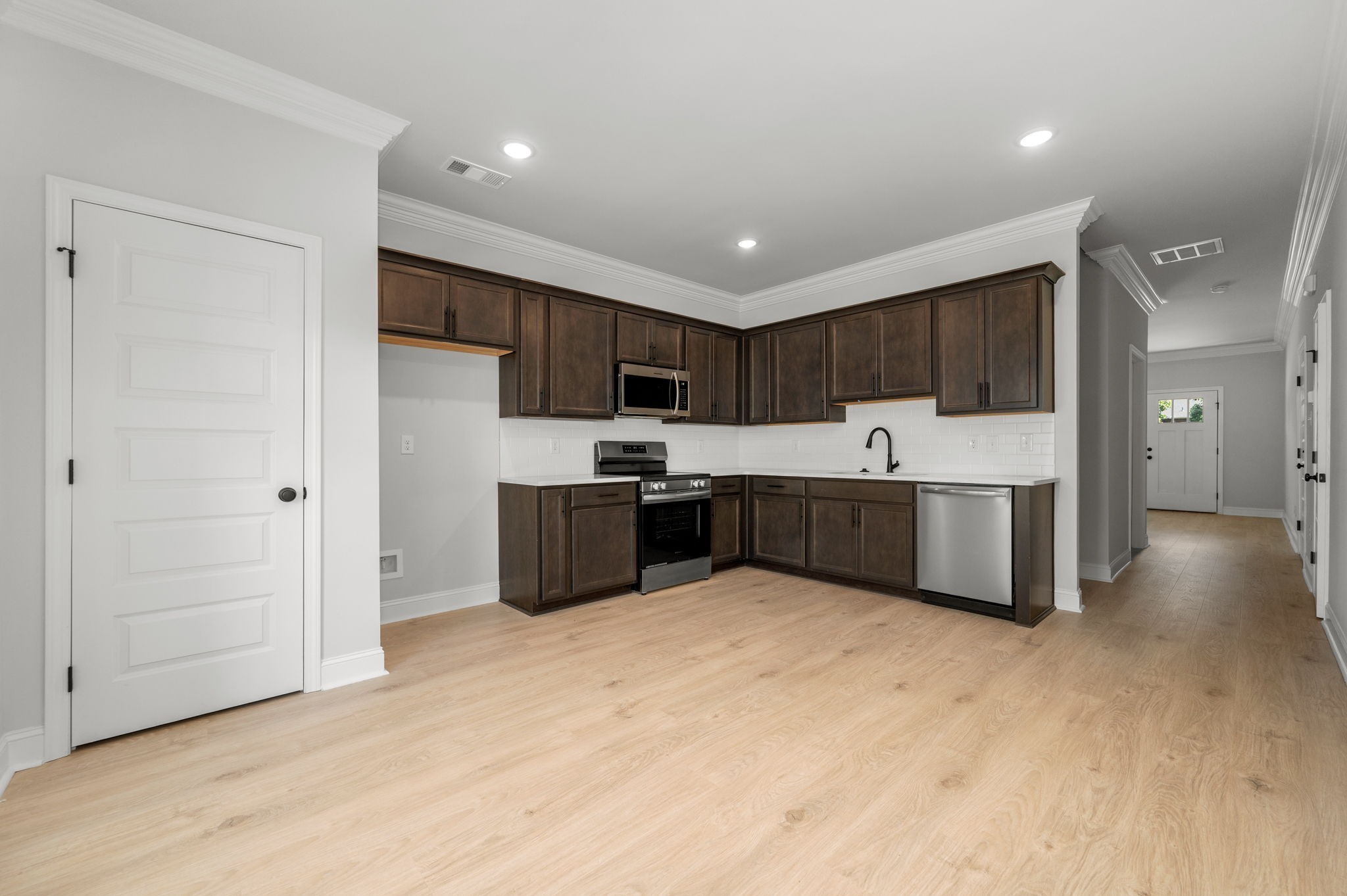 530 Rohan Drive Murfreesboro, TN 37129 - Photo 2 of 31 a large kitchen with stainless steel appliances granite countertop a stove a sink a refrigerator and cabinets