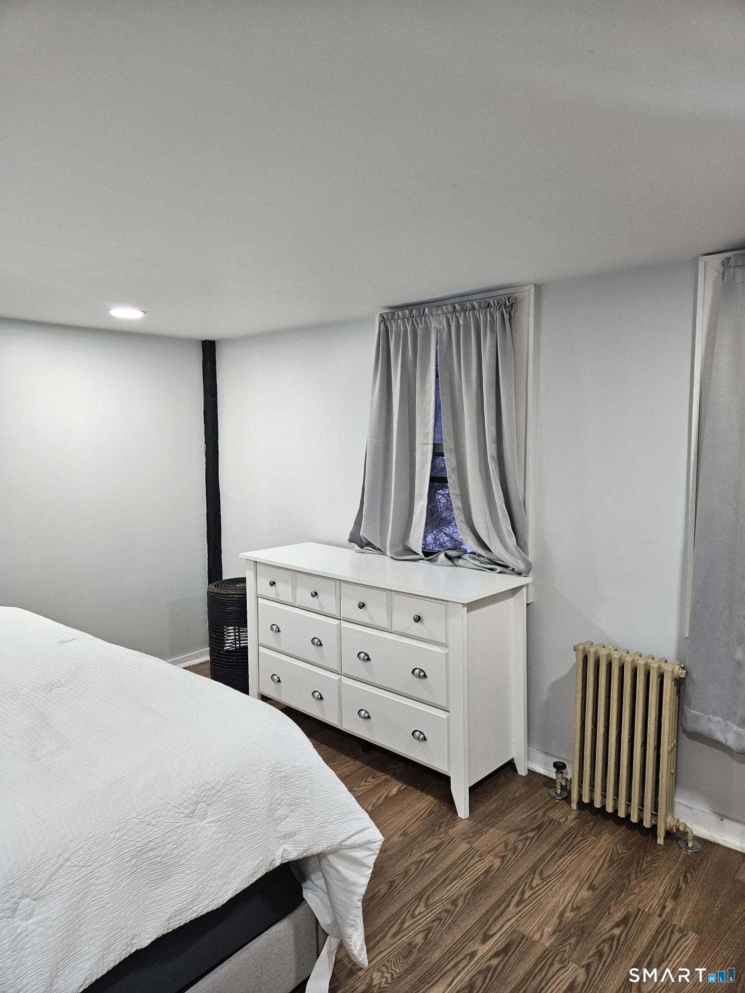 901 Baldwin Road Woodbridge, CT 06525 - Photo 11 of 27 a bed room with a bed and a dresser