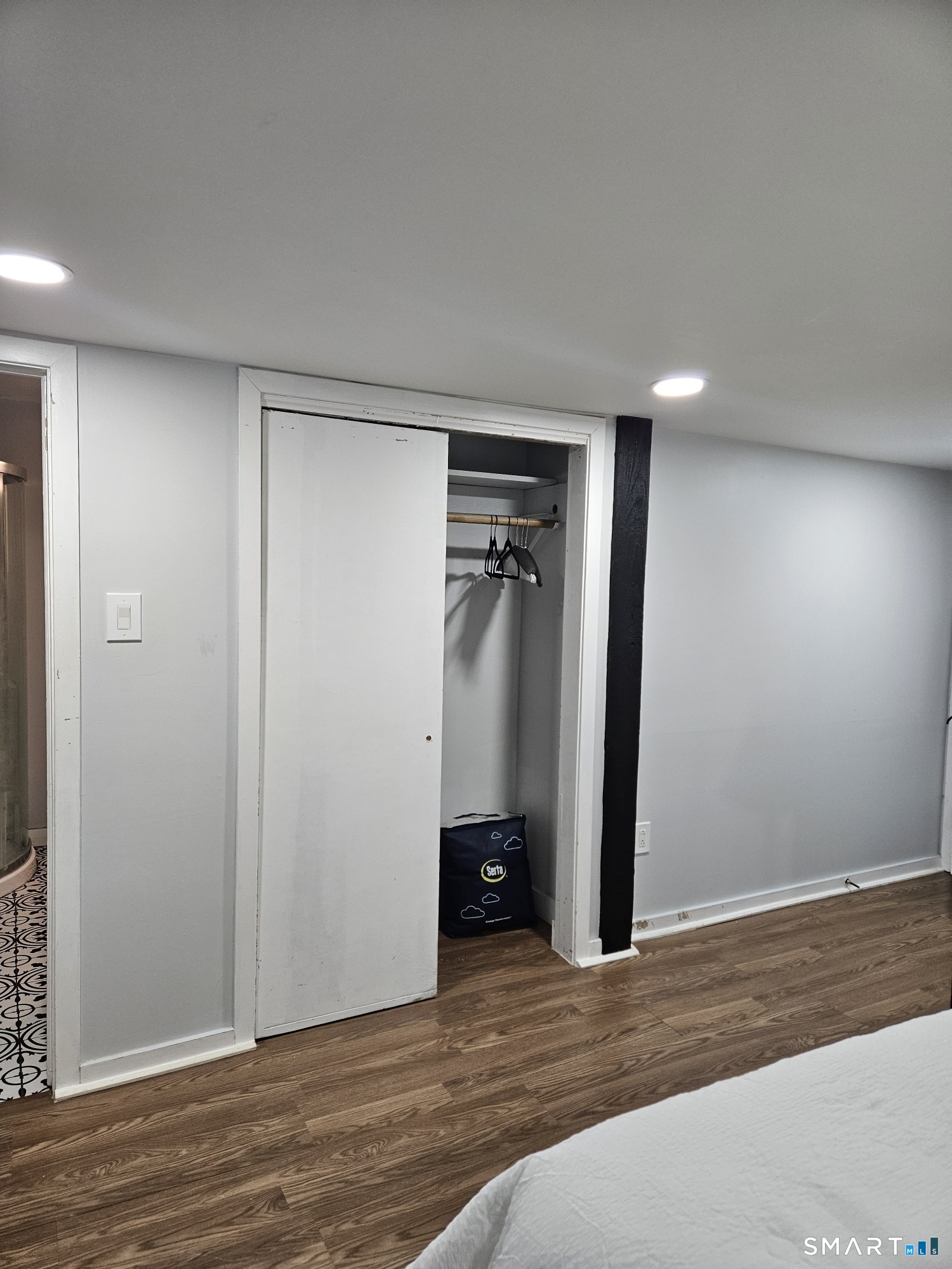 901 Baldwin Road Woodbridge, CT 06525 - Photo 14 of 27 a view of a room with closet and wooden floor