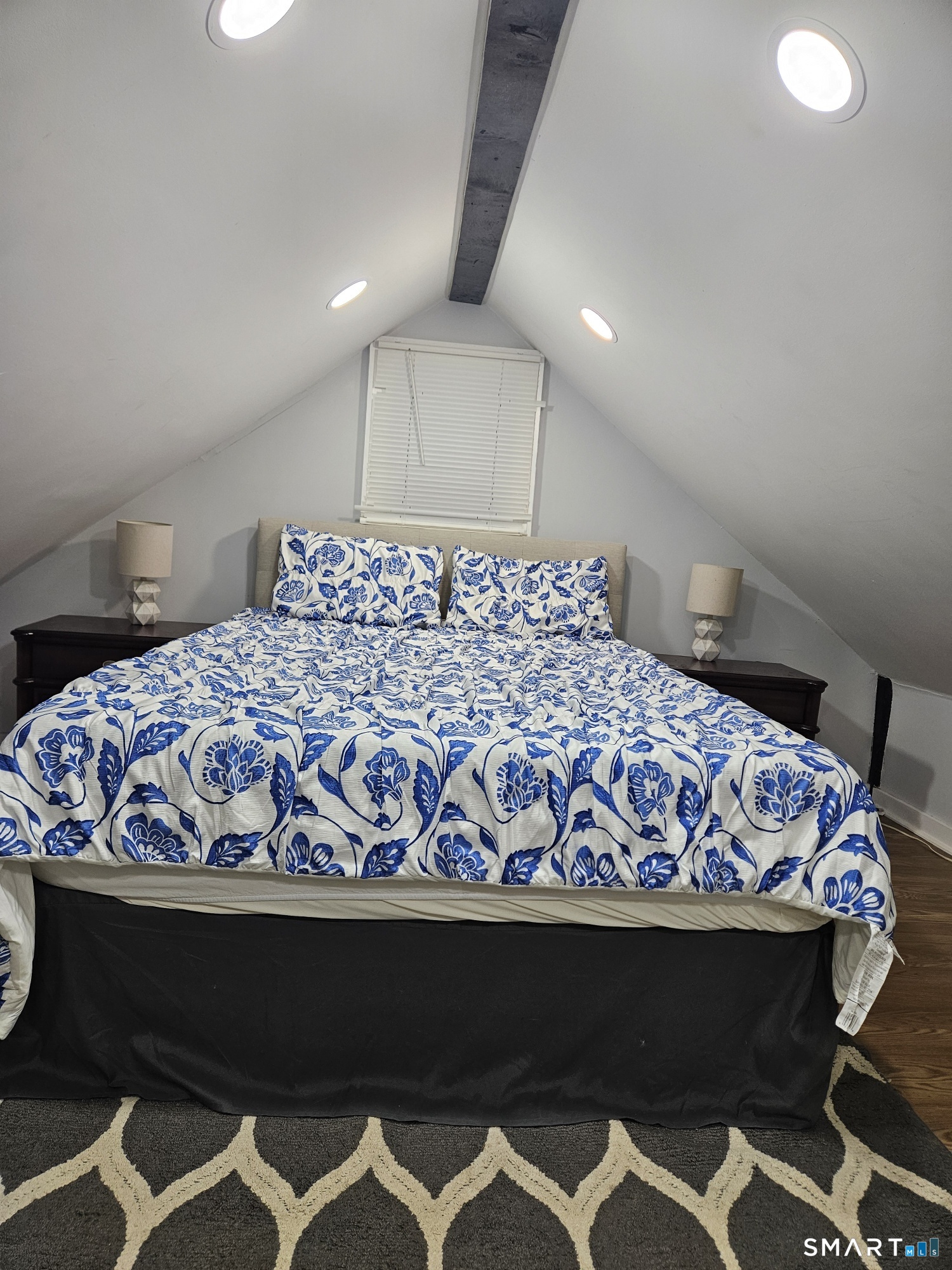 901 Baldwin Road Woodbridge, CT 06525 - Photo 22 of 27 a bedroom with a bed and painted wall