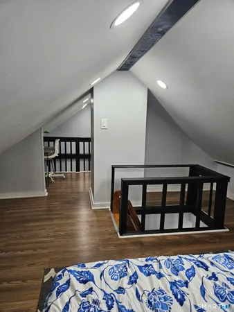 a view of a chairs and table in a room