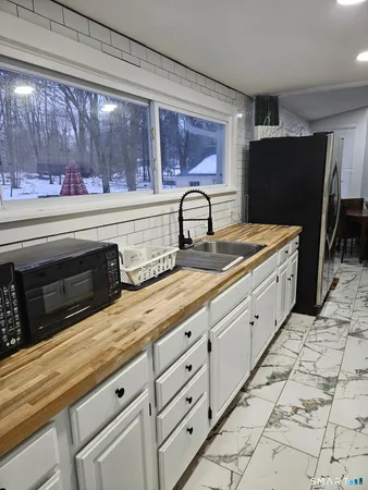 a view of a dining room with furniture