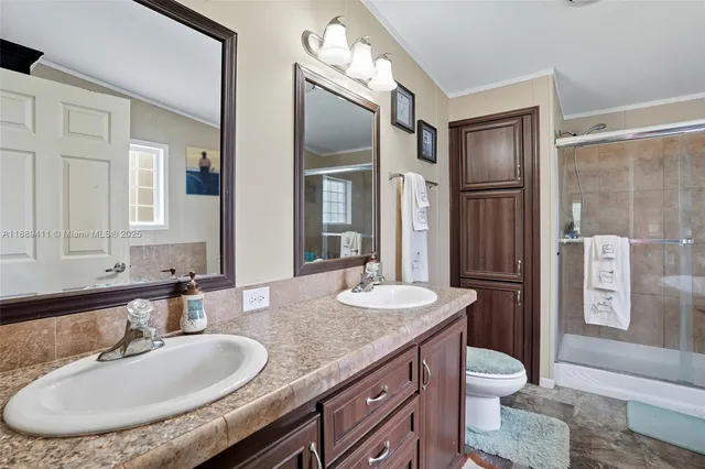 a living room with a couch and a book shelf