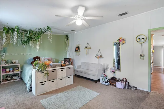 a bathroom with a sink vanity mirror and a mirror