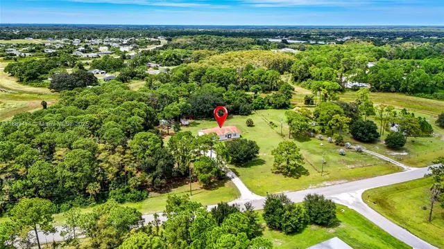 a living room with furniture fireplace and flat screen tv