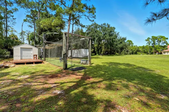 a fire hydrant in the middle of a field