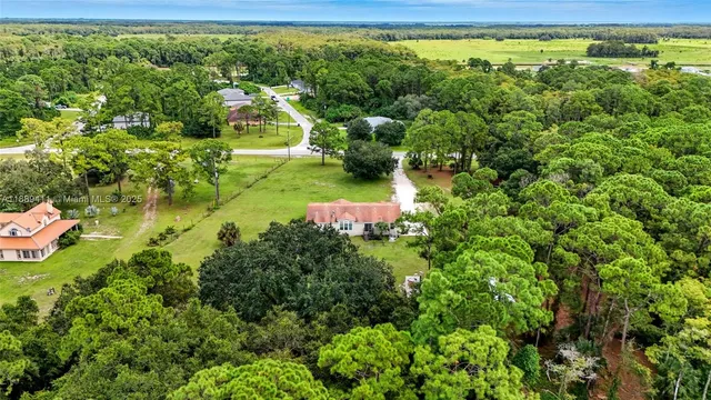 a view of a garden with an ocean