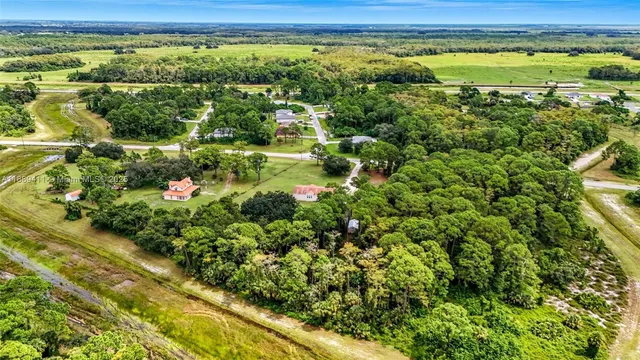 a view of a yard with an outdoor seating