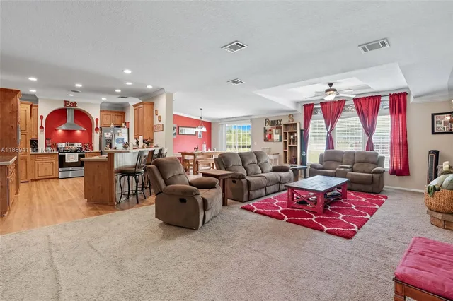 a living room with furniture and a rug