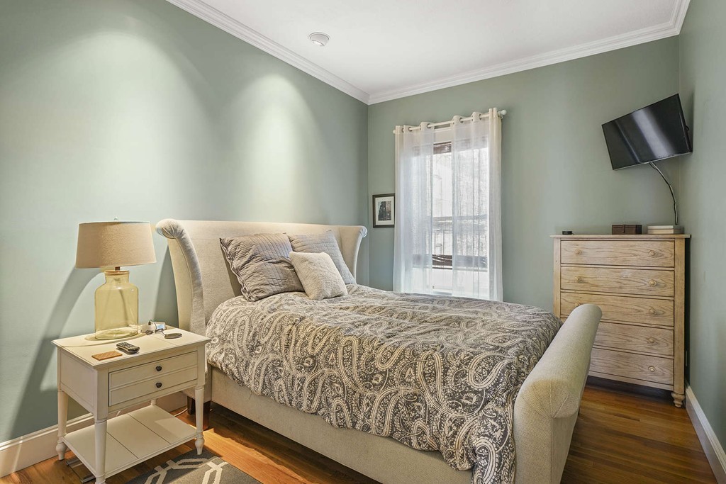 6 Columbus Square, Unit 3 Boston, MA 02116 - Photo 11 of 16 a bedroom with a bed and furniture