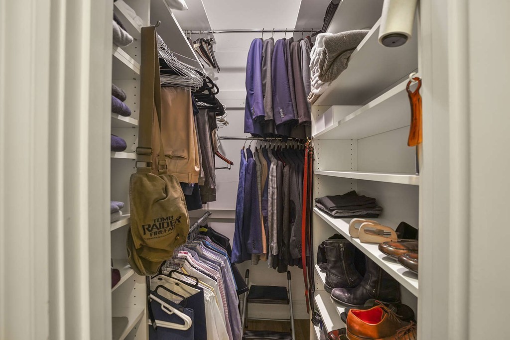6 Columbus Square, Unit 3 Boston, MA 02116 - Photo 13 of 16 a view of walk in closet with clothes and shoes