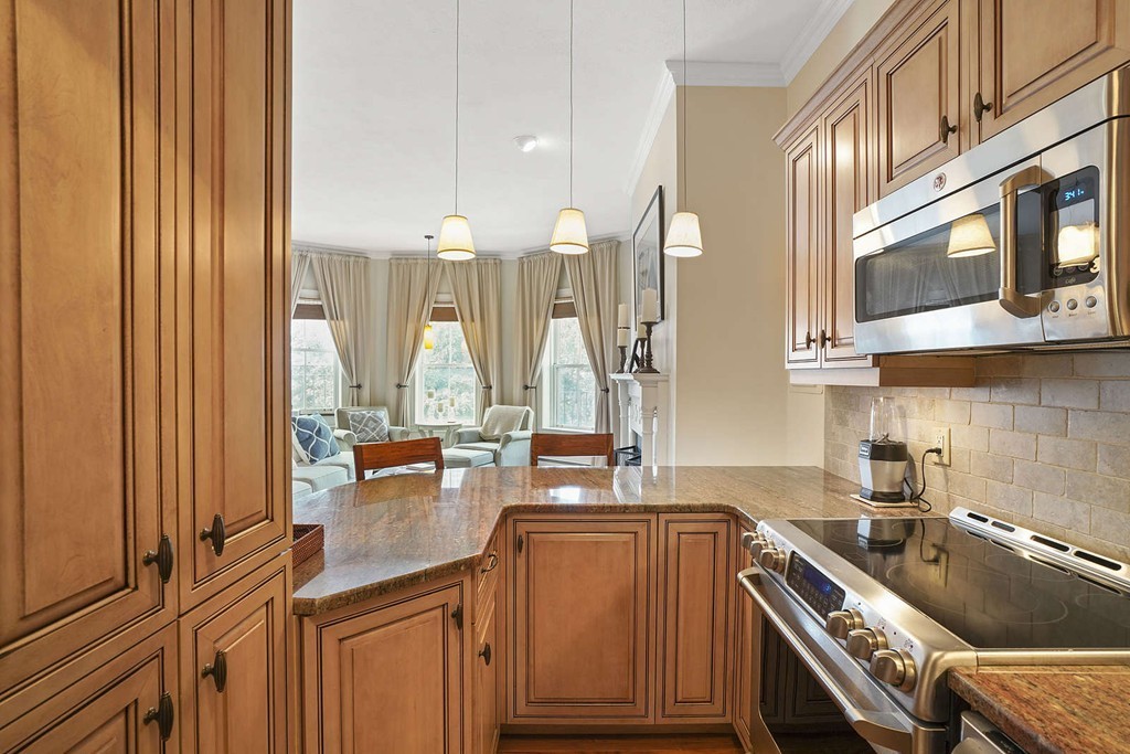 6 Columbus Square, Unit 3 Boston, MA 02116 - Photo 8 of 16 a kitchen with a sink and cabinets