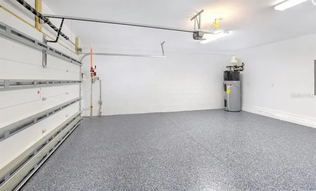 a view of a storage & utility room with racks on the wall