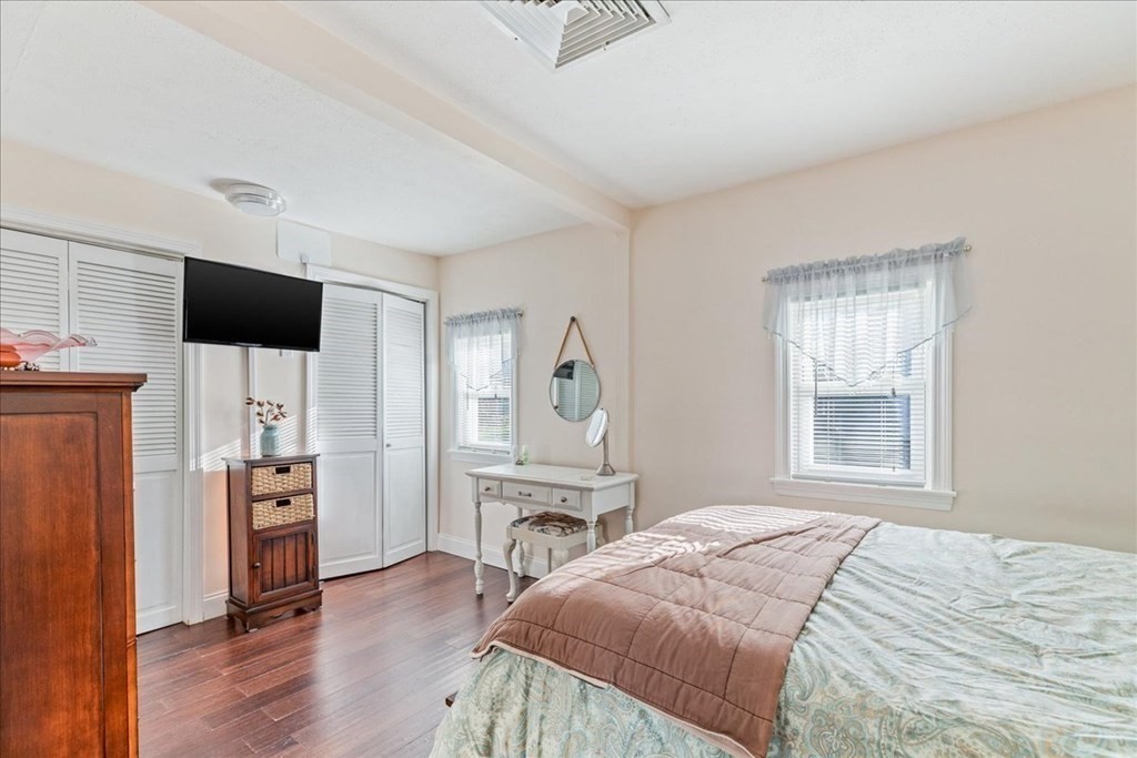 43 Fern Road Holbrook, MA 02343 - Photo 14 of 20 a bedroom with a bed and a flat screen tv