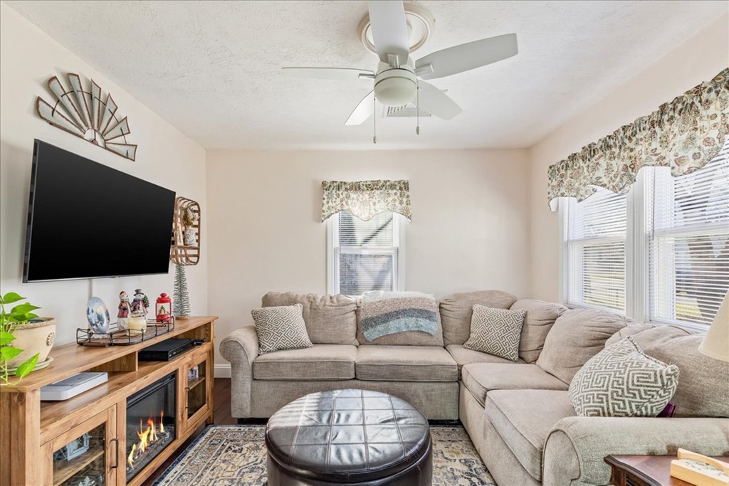 43 Fern Road Holbrook, MA 02343 - Photo 7 of 20 a living room with furniture and a flat screen tv