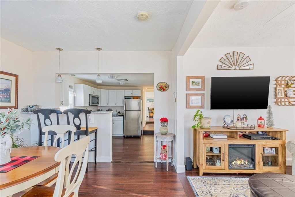 43 Fern Road Holbrook, MA 02343 - Photo 10 of 20 a living room with furniture and a flat screen tv