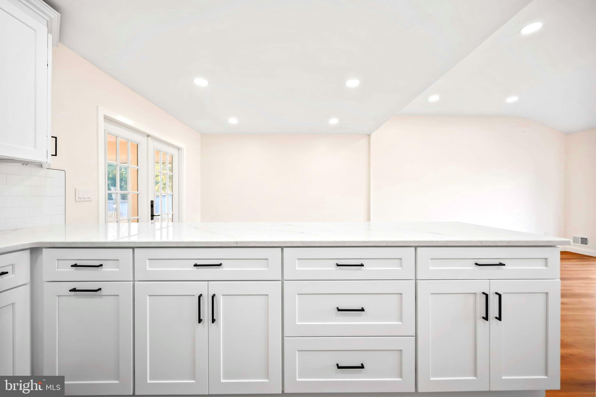 61 Argonne Avenue Hamilton, NJ 08620 - Photo 16 of 38 a view of white cabinets and sink