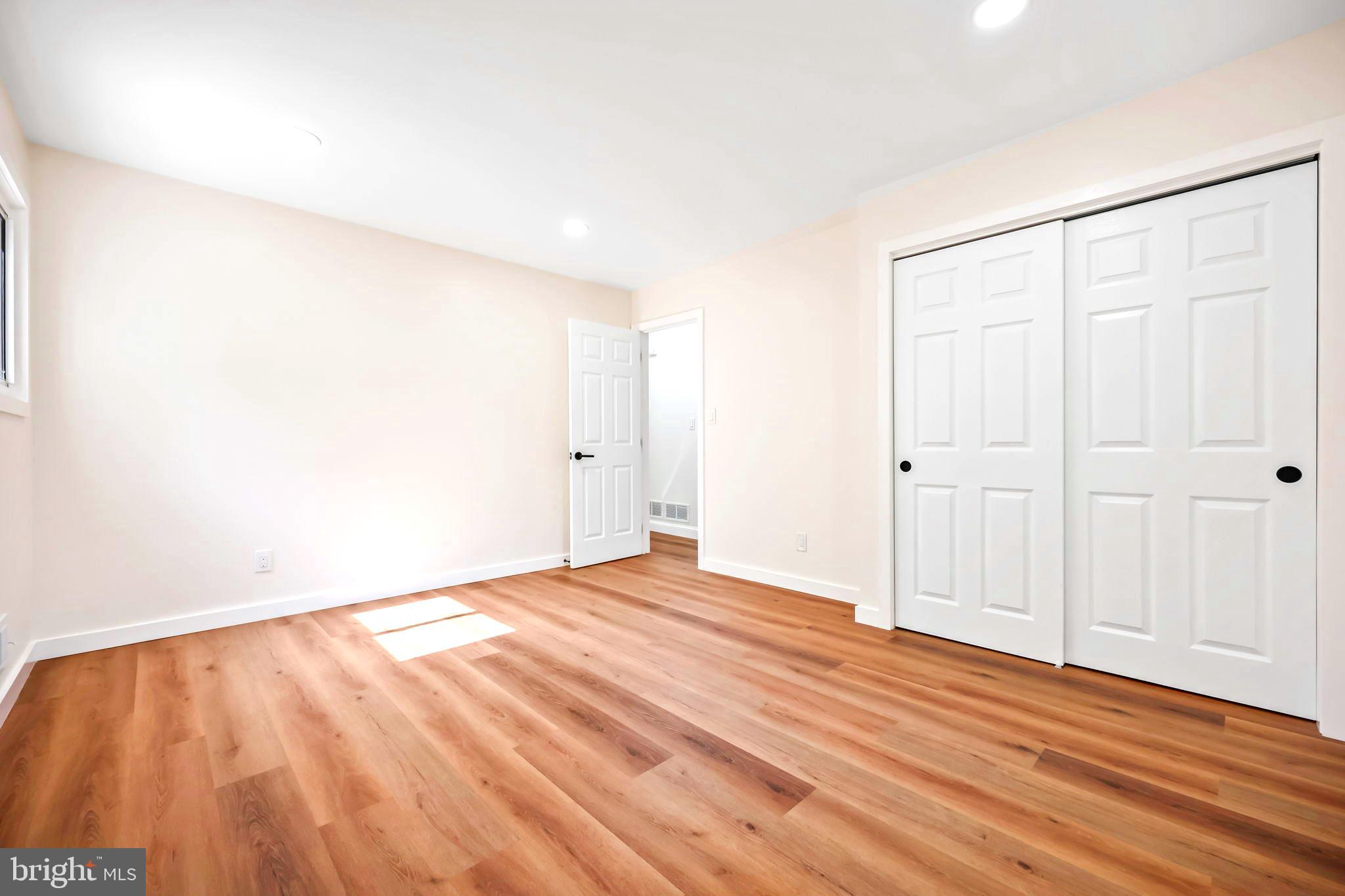 61 Argonne Avenue Hamilton, NJ 08620 - Photo 24 of 38 a view of empty room with wooden floor and entryway