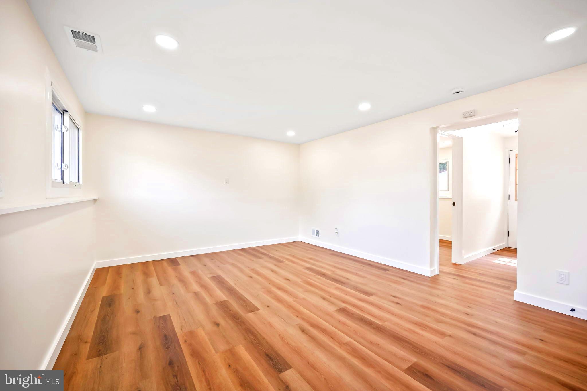 61 Argonne Avenue Hamilton, NJ 08620 - Photo 29 of 38 a view of empty room with wooden floor