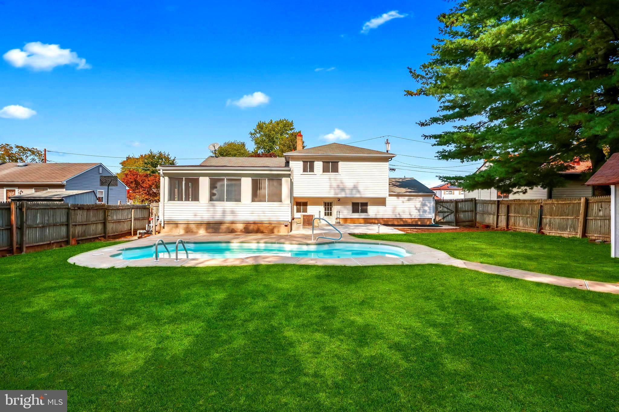 61 Argonne Avenue Hamilton, NJ 08620 - Photo 34 of 38 a view of a house with a backyard porch and sitting area