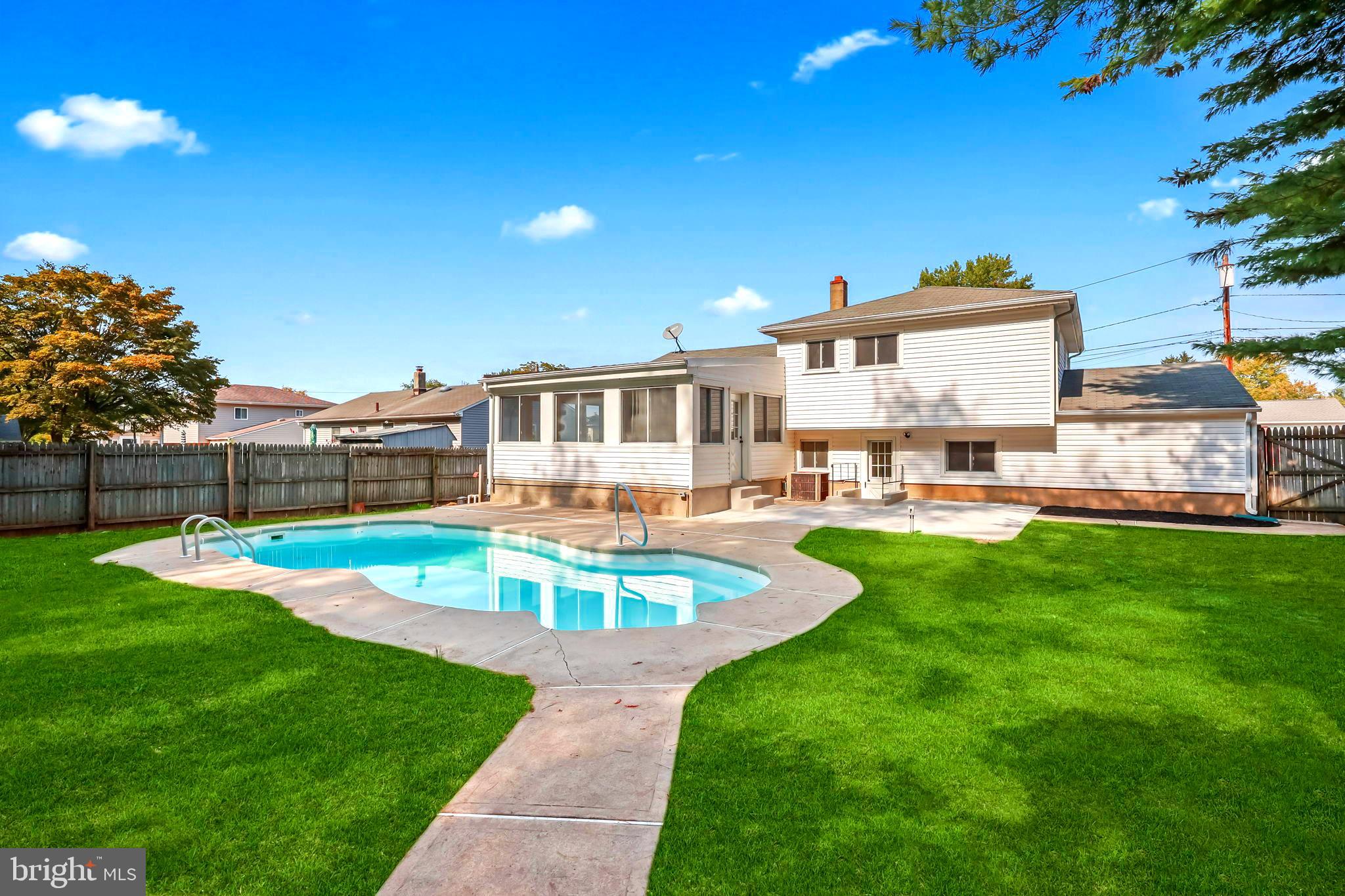 61 Argonne Avenue Hamilton, NJ 08620 - Photo 35 of 38 a view of a house with a swimming pool