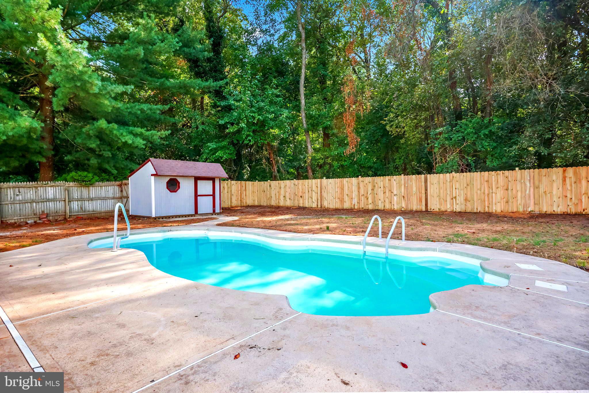 61 Argonne Avenue Hamilton, NJ 08620 - Photo 36 of 38 a view of a swimming pool with a yard