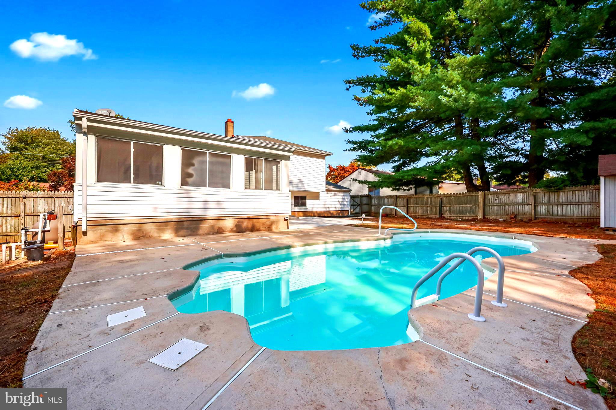61 Argonne Avenue Hamilton, NJ 08620 - Photo 37 of 38 a front view of a house with swimming pool