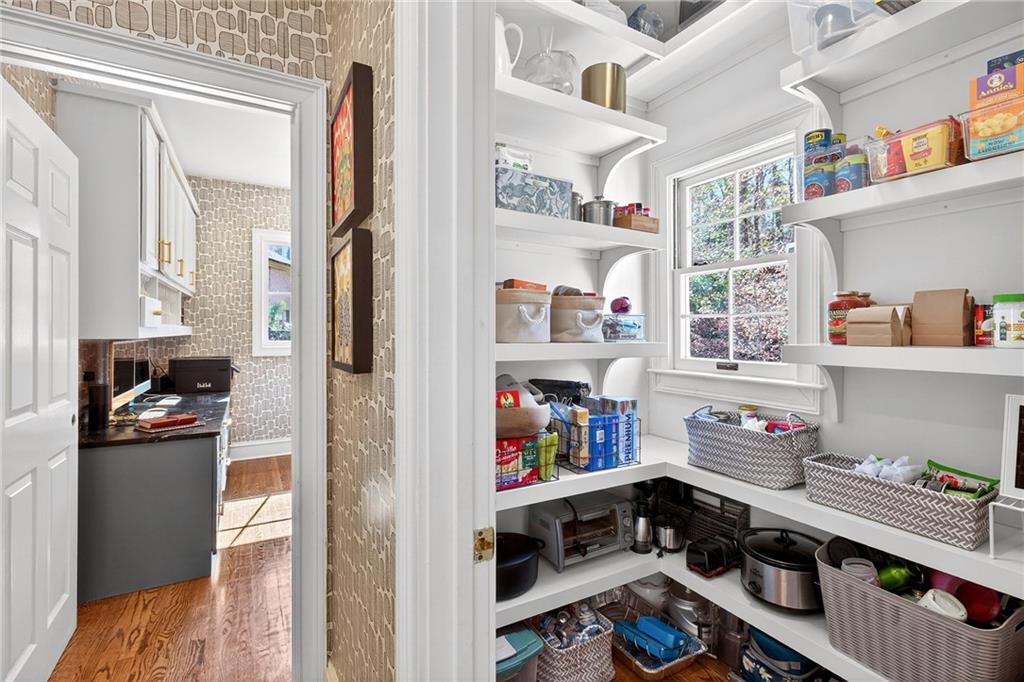 3642 Mayfair Road Northeast Atlanta, GA 30305 - Photo 16 of 40 a kitchen with a refrigerator and a stove top oven