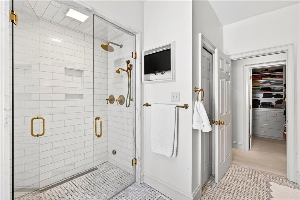 3642 Mayfair Road Northeast Atlanta, GA 30305 - Photo 24 of 40 a bathroom with a shower