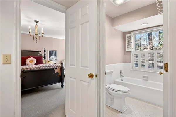 a bathroom with a bathtub sink and toilet