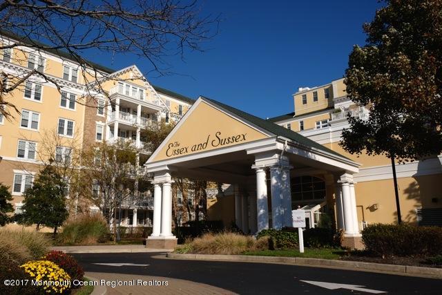 700 Ocean Avenue, Unit 437 Spring Lake, NJ 07762 - Photo 11 of 24 a view of a building with a tree