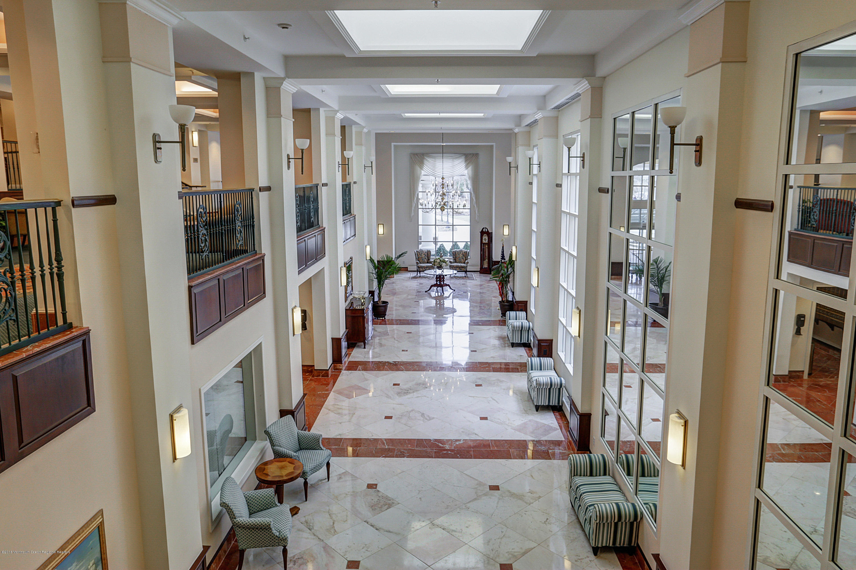 700 Ocean Avenue, Unit 437 Spring Lake, NJ 07762 - Photo 12 of 24 a view of an entryway with livingroom and furniture