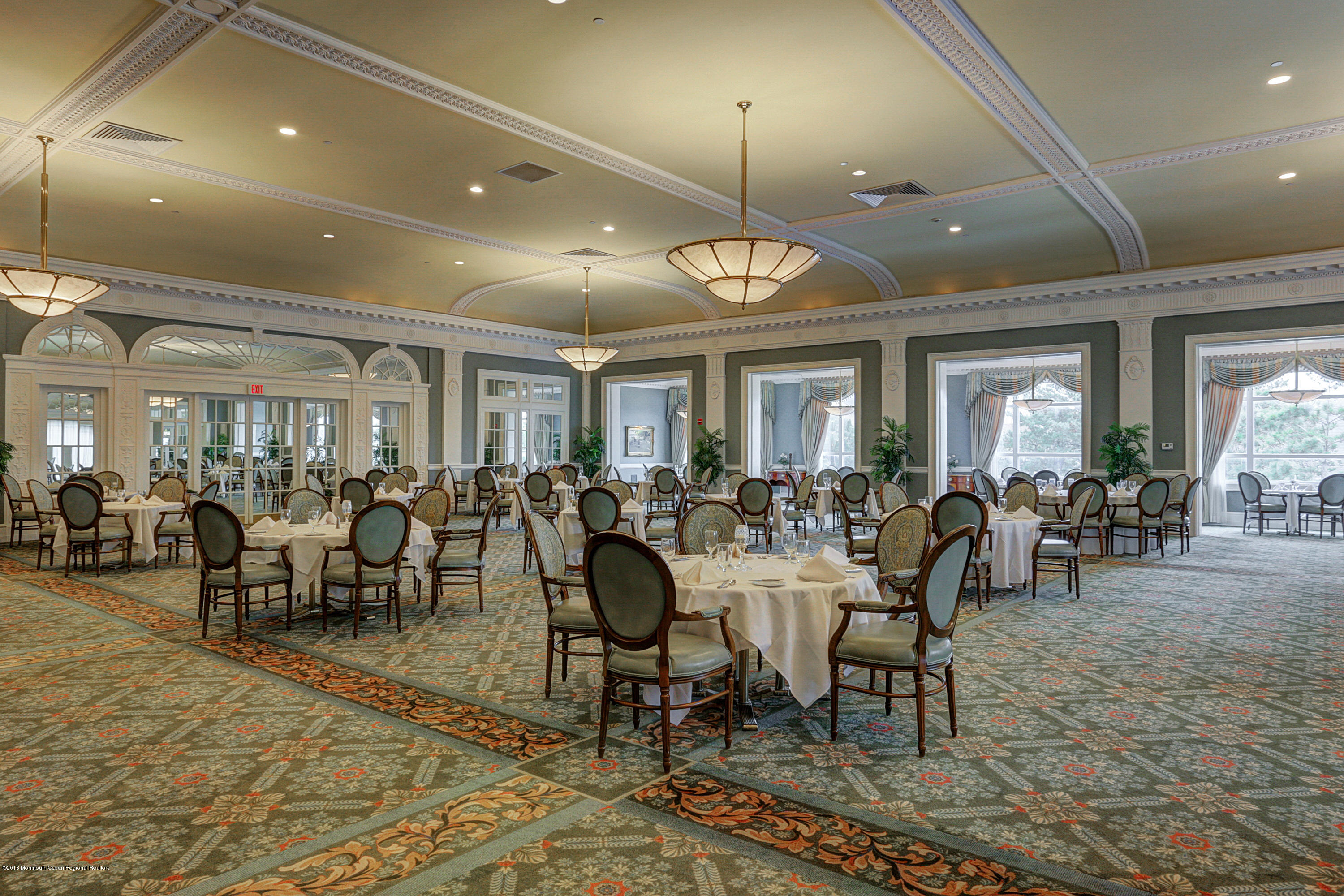 700 Ocean Avenue, Unit 437 Spring Lake, NJ 07762 - Photo 17 of 24 an outdoor space with lots of tables and chairs