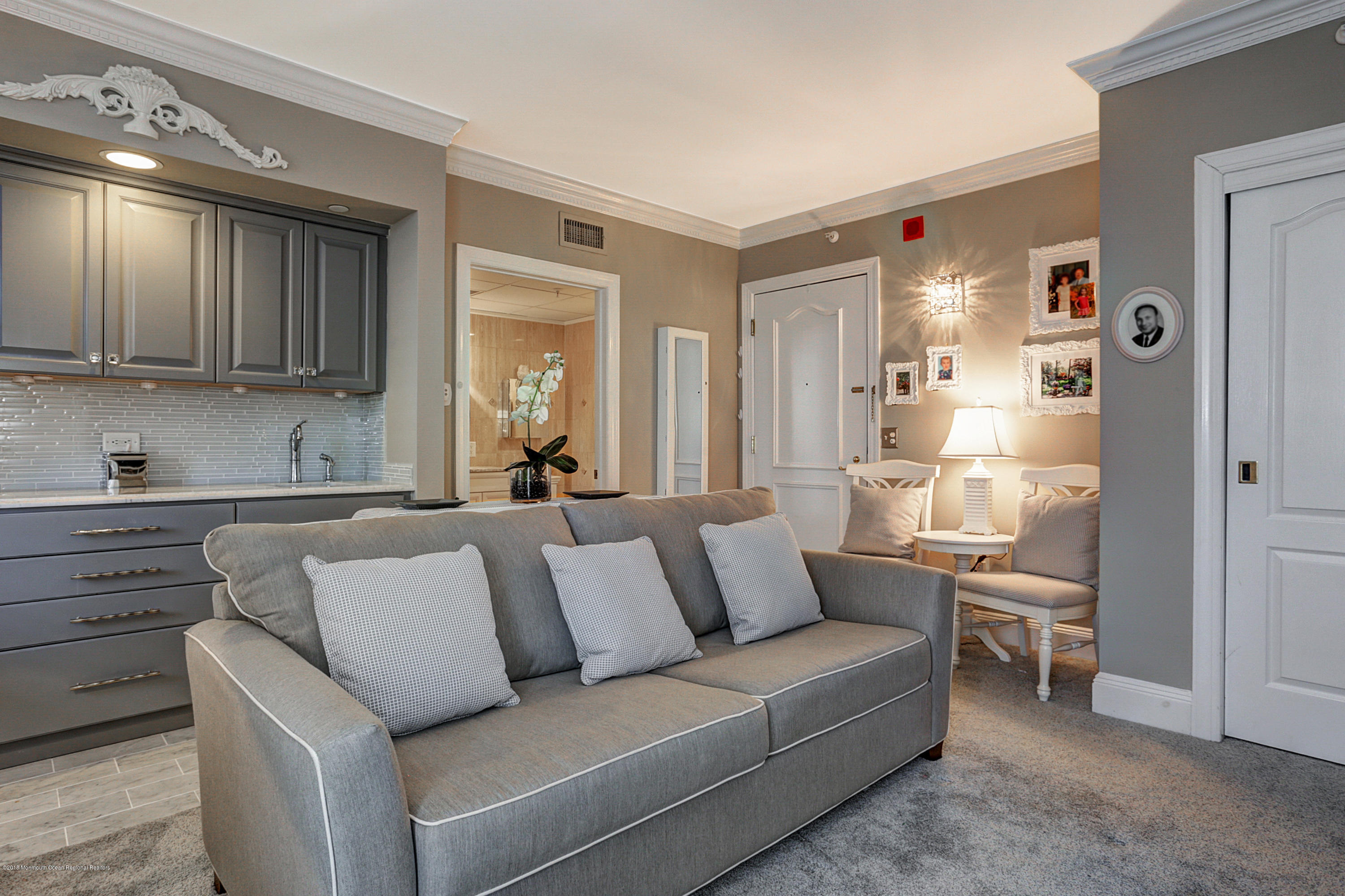700 Ocean Avenue, Unit 437 Spring Lake, NJ 07762 - Photo 3 of 24 a living room with furniture and a window