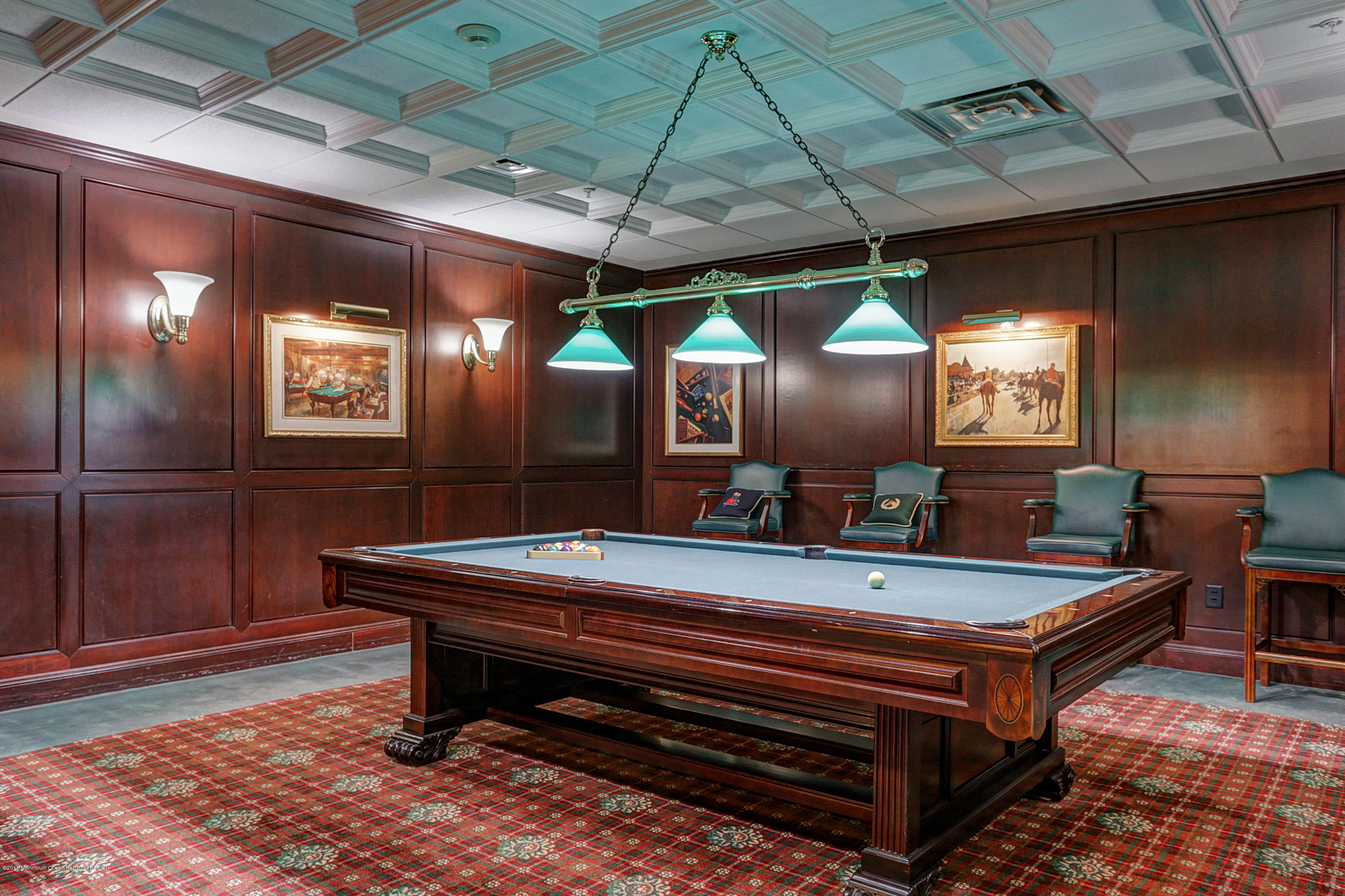 700 Ocean Avenue, Unit 437 Spring Lake, NJ 07762 - Photo 22 of 24 a room with pool table and wooden floor