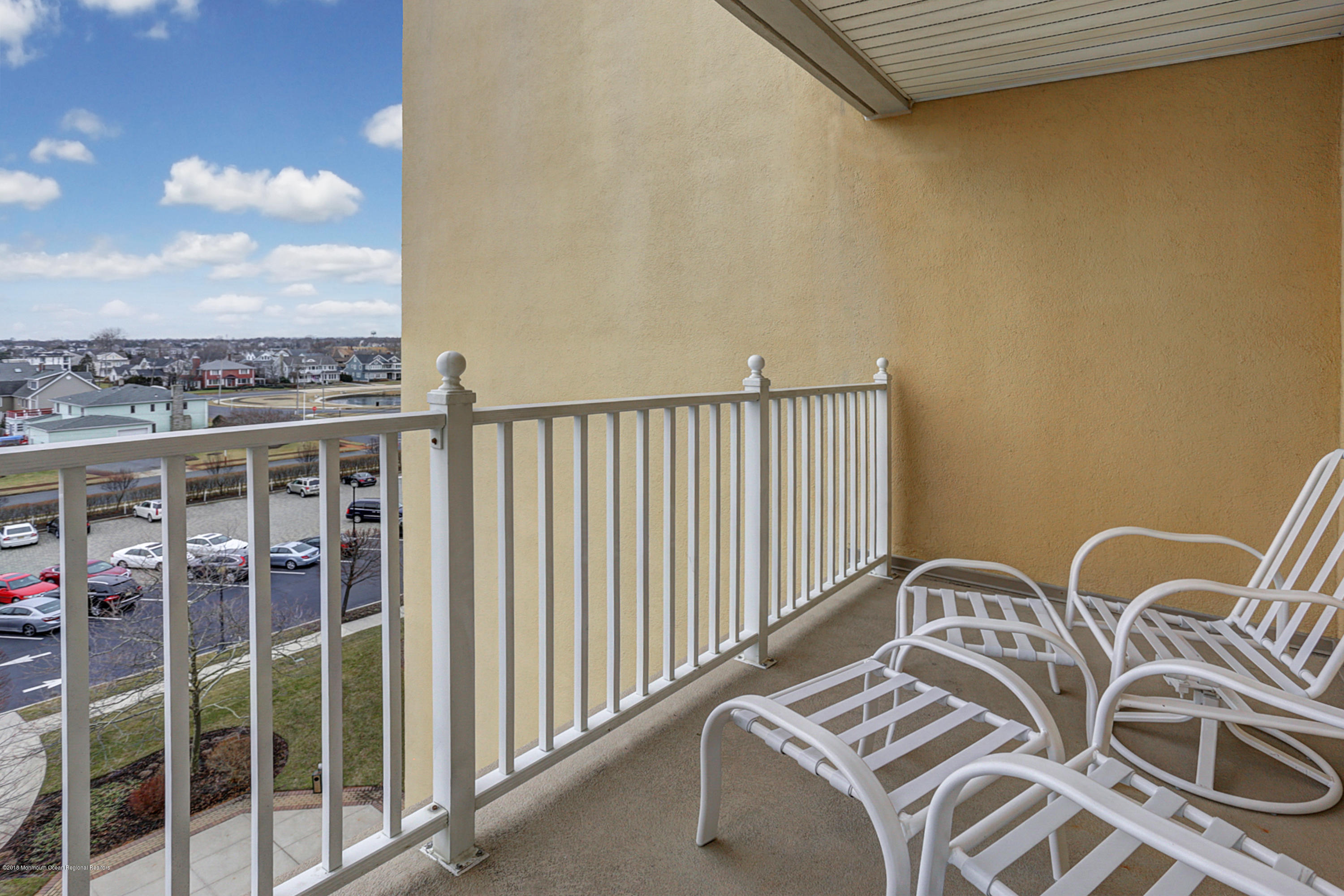 700 Ocean Avenue, Unit 437 Spring Lake, NJ 07762 - Photo 10 of 24 a balcony with a water view