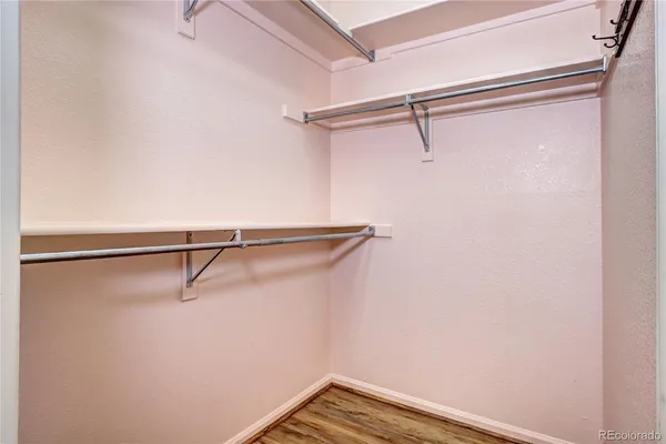a view of a room with racks on the wall