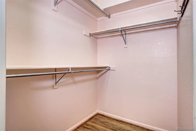 a view of a room with racks on the wall