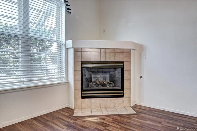 a living room with a fireplace