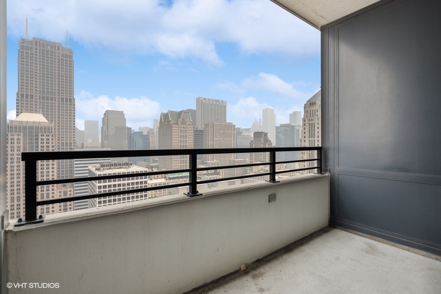 235 West Van Buren Street, Unit 4121 Chicago, IL 60607 - Photo 17 of 25 a view of a terrace with city view