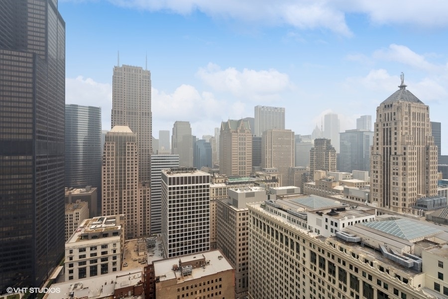 235 West Van Buren Street, Unit 4121 Chicago, IL 60607 - Photo 18 of 25 a view of city with tall buildings