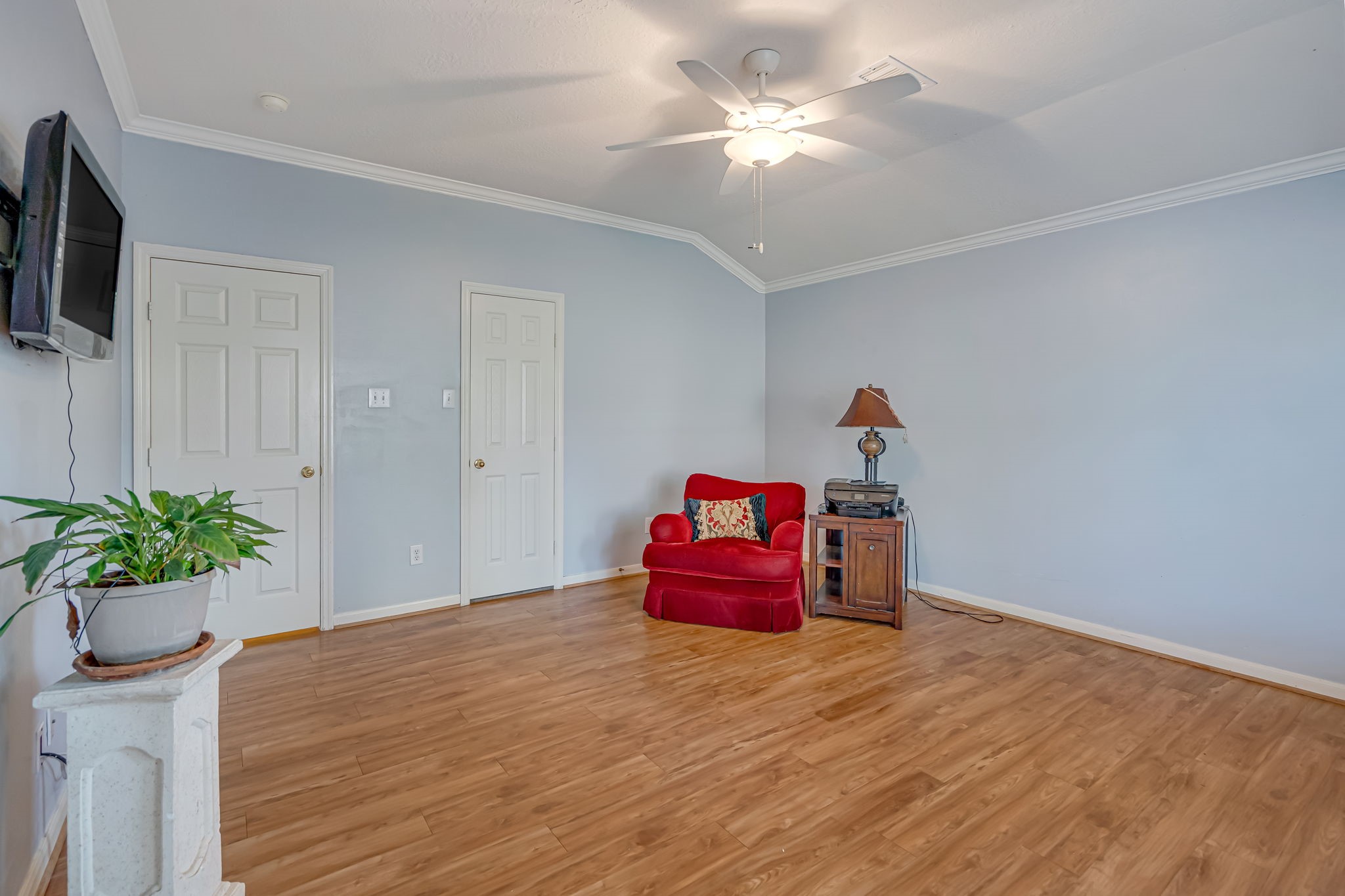 4614 Neches Trail Lane Spring, TX 77388 - Photo 11 of 29 a bedroom with furniture and a chandelier