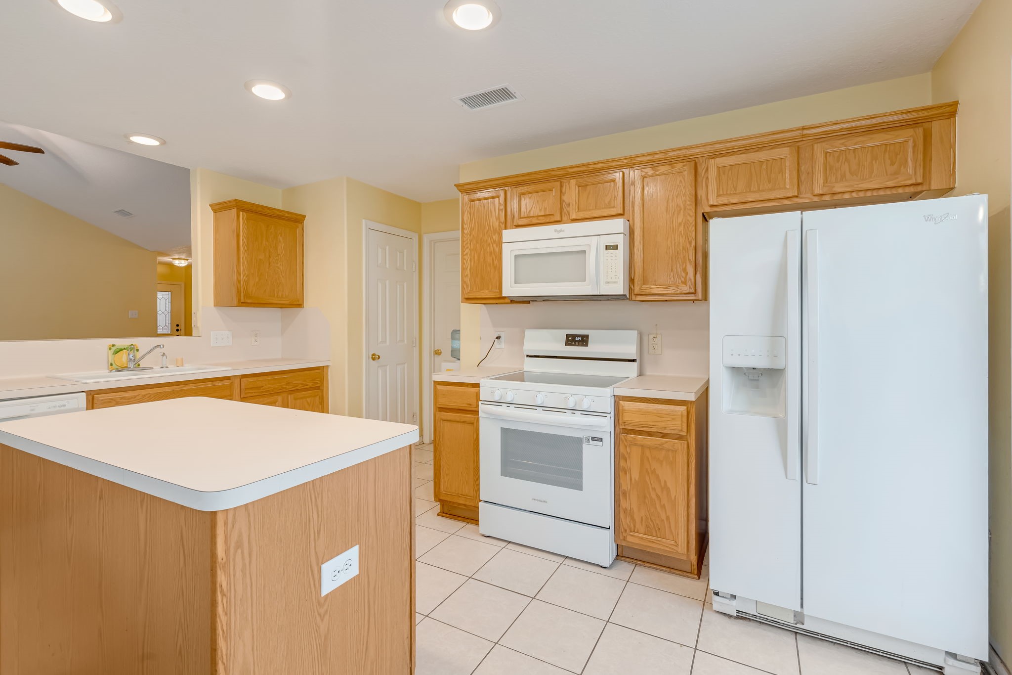 4614 Neches Trail Lane Spring, TX 77388 - Photo 17 of 29 a kitchen with stainless steel appliances a refrigerator sink and stove