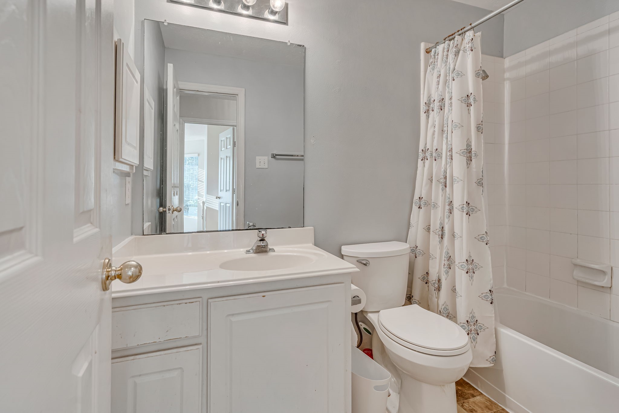 4614 Neches Trail Lane Spring, TX 77388 - Photo 23 of 29 a bathroom with a sink a toilet and shower