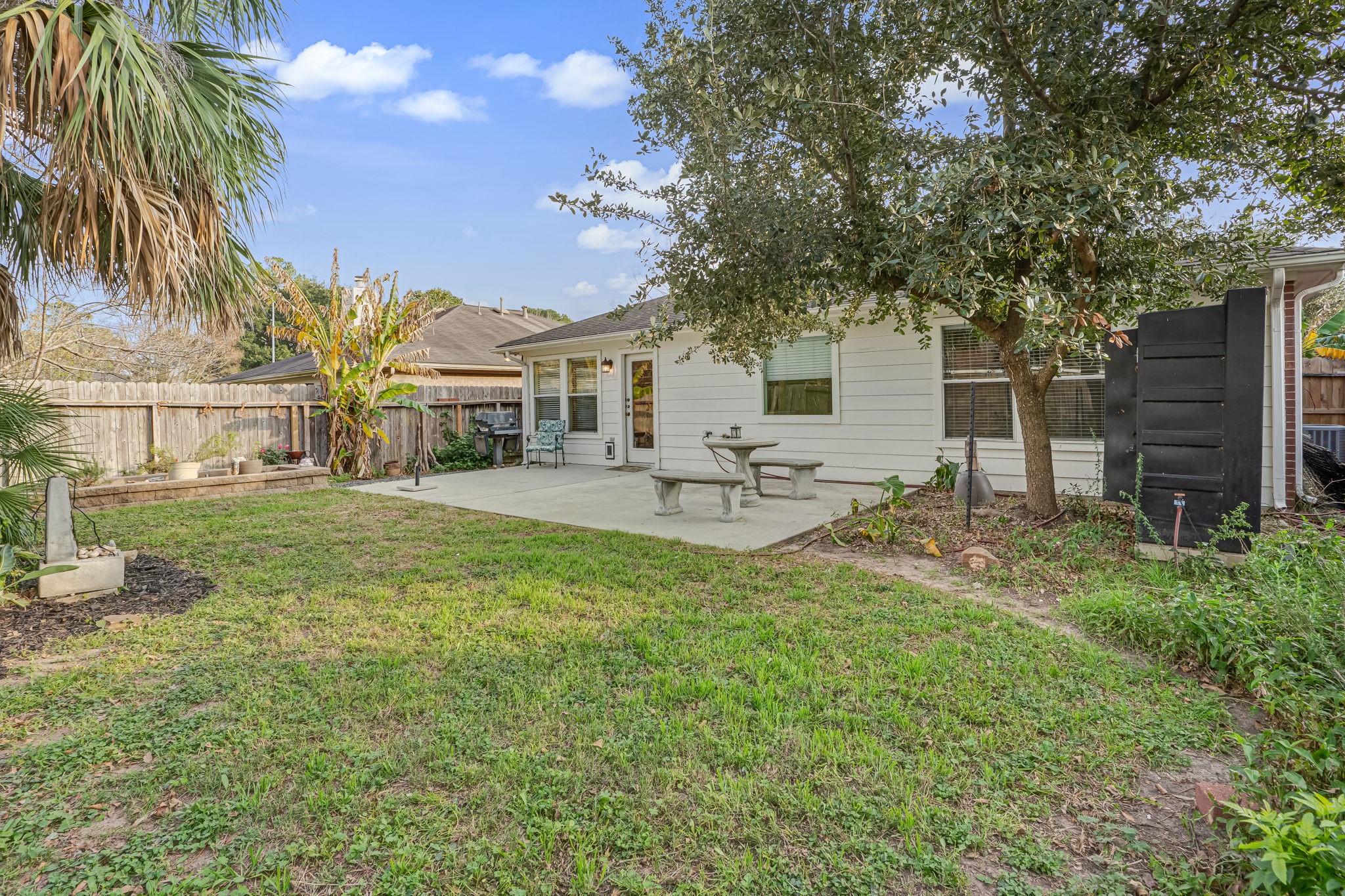 4614 Neches Trail Lane Spring, TX 77388 - Photo 27 of 29 a front view of a house with garden